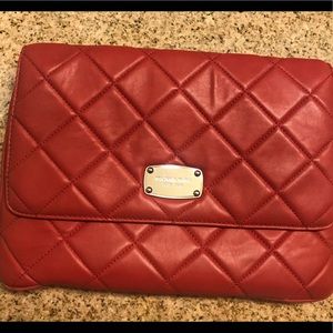 Oversized Michael Korda red quilted clutch